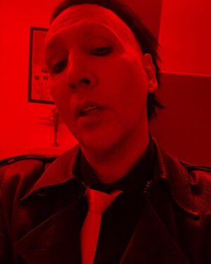 Marilyn Manson Instagram - I went for a ride in Nashville in a Harley-David-Son-of-a-Bitch sidecar. It was attached to an actual motor bike.  I was given a lavish tie from Norman Reedus.  I witnessed an actual violent roller derby. It was the best post-Easter.  Thank you to Norman.