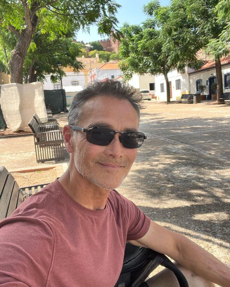 Mark Dacascos Instagram - Aloha from Portugal 🇵🇹! “What is this life if full of care, We have no time to stand (sit😎) and stare?” W. H. Davies 🙏🏽❤️🤙🏽 #breathe #gratitude #presence