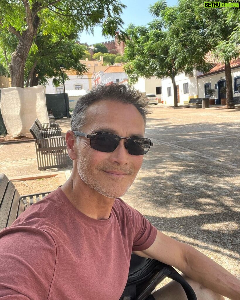 Mark Dacascos Instagram - Aloha from Portugal 🇵🇹! “What is this life if full of care, We have no time to stand (sit😎) and stare?” W. H. Davies 🙏🏽❤🤙🏽 #breathe #gratitude #presence