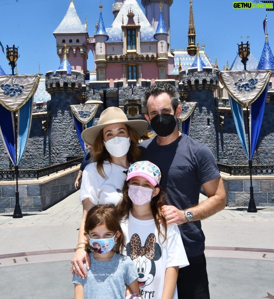 Marla Sokoloff Instagram - We’re back! 🐭 ✨Alec thoroughly enjoyed waiting in line for this photo. ✨ EDIT : masks are required friends or Mickey kicks you out. 🌟 . . #disneyland #disney #disneyfamily #cinderellacastle #familyphoto Disneyland