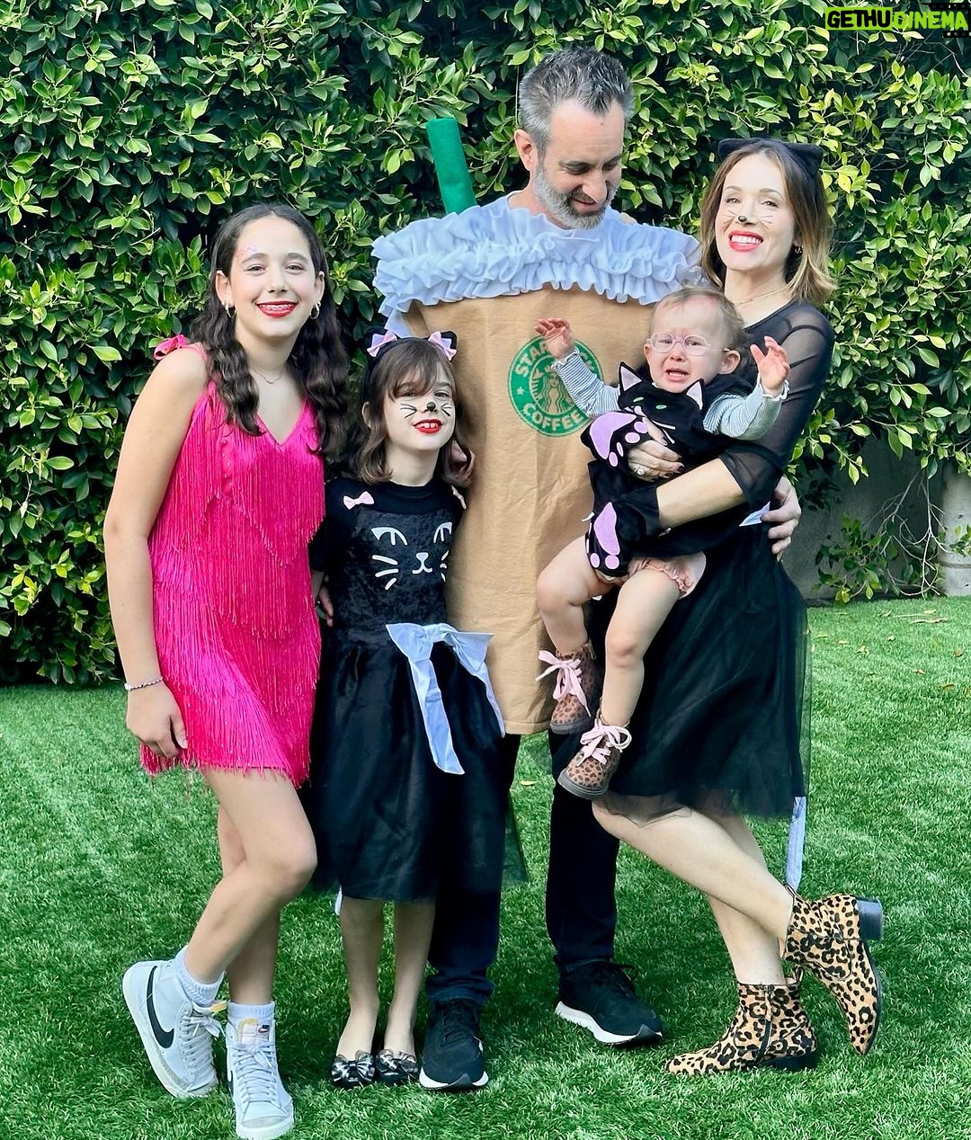 Marla Sokoloff Instagram - Taylor Swift, black cats, and a… Frappuccino. Also, Harper apparently hates Disneyland and Halloween what am I gonna do? #halloween #halloweencostume #halloween2023 #familycostume