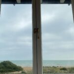 Marsha Thomason Instagram - In my happy place, reading a great book with a view of the sea. Book: When No One Is Watching by Alyssa Cole.