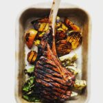 Martin Juneau Instagram - Tomahawk, betteraves jaunes et romaines chargrilled. 🥩 🥬 🔥