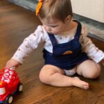 Mary Katharine Ham Instagram - This is my third kid, so I would like my flowers for remembering a 🦃 themed outfit and getting her to wear a 🎀. I forgot her pants and shoes. 🤷🏻‍♀️