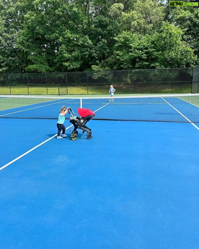 Mary Katharine Ham Instagram - A patient big sis practices tennis, but with obstacles. 🎾👧🏼👶🏻
