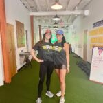 Mary Katharine Ham Instagram - We did it! Here is @lastewfit reminding me it’s time to rejoin the #quadsquad with her now that I’m back in the gym. The fact that our poses, hats, and shirts are perfectly aligned and complementary is a coincidence and why we make perfect workout buddies. I just did bodyweight squats and felt pretty good! One woman (Woo, Em!) and one man (Yay, Steve!) at the workout did the full weight. I can work up to it for next year. Thank you to everyone who joined us to honor 1LT Travis Manion (USMC) and to all those who supported us and thanks to @zweetsport for hosting us! It’s always fun to honor the fallen by challenging the living, and I certainly thought I would be in a heap a lot earlier than I was today, so now I have no excuses for future workouts. Getting stronger every day! If you’ve never done anything with @travismanionfoundation before, find a service project, run, or workout near you (travismanion.org) and join us. They’re great folks to meet in your community! #ifnotmethenwho #manionwod Zweet Sport