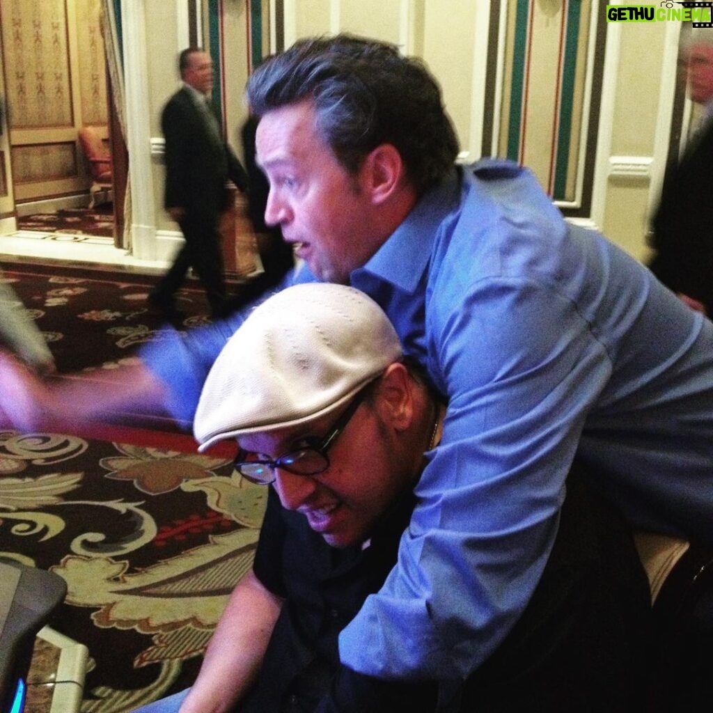 Matthew Perry Instagram - Me climbing on my friend Roger at a slot machine. What happens in Vegas, gets posted on Instagram. #tbt