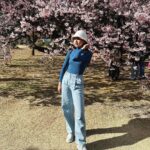 Maudy Ayunda Instagram – Tokyo stroll in my new fave drapey denim pants. 🌸 Shinjuku Gyoen National Garden