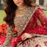 Maya Ali Instagram - 𝐉𝐚𝐡𝐚𝐧𝐀𝐫𝐚 𝐁𝐫𝐢𝐝𝐚𝐥 𝐂𝐨𝐥𝐥𝐞𝐜𝐭𝐢𝐨𝐧’𝟐𝟑 Coming Soon Nisa, a captivating symphony of deep red organza and raw silk Lehanga, merges tradition with innovation. Passion and romance echo in the timeless hue, while intricate handcrafted details dance on the flowing grandeur. The ethereal organza dupatta crowns this ensemble, enveloping it in sheer, weightless elegance. Jewellery: @kundan.co #KanwalMalikOfficial #KanwalMalik #Formals #Asianoutfits #Pakistaniattire #Lahore #Karachi #Weddings #Pakistan #luxuryformals #JahanAra #bridals