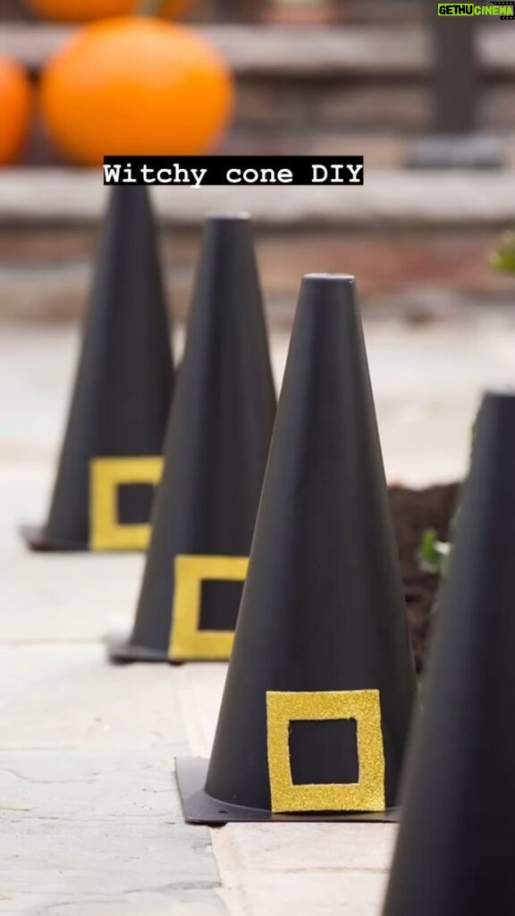 Meaghan B. Murphy Instagram - The witch is in! 🧙🚨HALLOWEEN DIY CONES How to: 🎨 Spray paint safety cones black 🧙 Cut buckles out of adhesive glitter paper; stick on. 👻 Line your walkway #halloween #witch #thewitchisin #halloweendecor #halloweencraft #halloweencrafts Halloween Headquarters