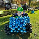 Meaghan B. Murphy Instagram - Mamma Mia! My fully charged friend ⚡️Danielle (p. 177 of YFCL) + @dreamfactoryballoons 🎈have outdone themselves once again to raise $ and awareness for @crohnscolitisfoundation_nj For the 10th year, friends and neighbors are invited to tour the balloon fantasy land, spin the wheel, win a prize & make a donation for the Crohn's and Colitus Foundation. Danielle started the tradition as a way of coping after their 9-year-old was diagnosed with the disease. I celebrate + admire her for channeling pain into purpose. It feels good to do good! Click the donation button to give back. And in case you were wondering, my last-minute costume = French Kiss! Get it: Beret + Kiss concert tee! #balloonart #balloons #halloween #crohnsandcolitis #bestfieldnj #kiss #mariobrothers Westfield, New Jersey