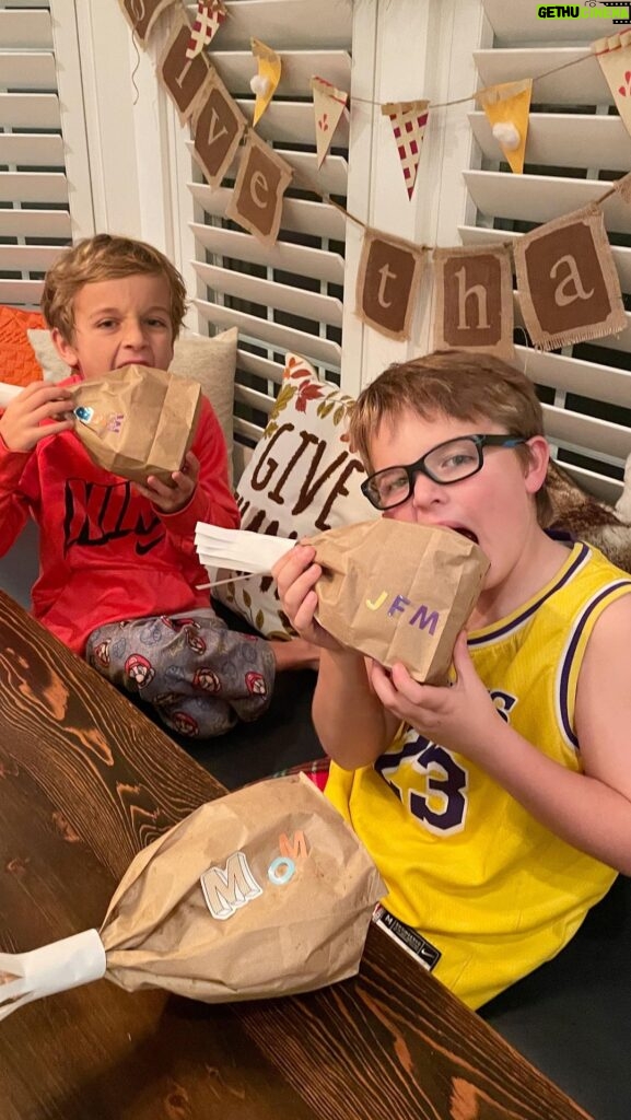 Meaghan B. Murphy Instagram - There’s still time to pull off this #kidstable #thanksgiving #craft! How to: Fill a brown paper bag with popcorn 🍿 (and maybe some leftover Halloween candy!), twist the top closed + tape a piece of white computer paper around it; fray the edges. You can add names with stickers to use as fun name cards at place setting 🍽...but Team Murphy got hungry! 🦃 #thanksgiving #diy #kidstable #wdcelebrates #womansday #placecards #namecards #turkeylegs Thanksgiving Dinner