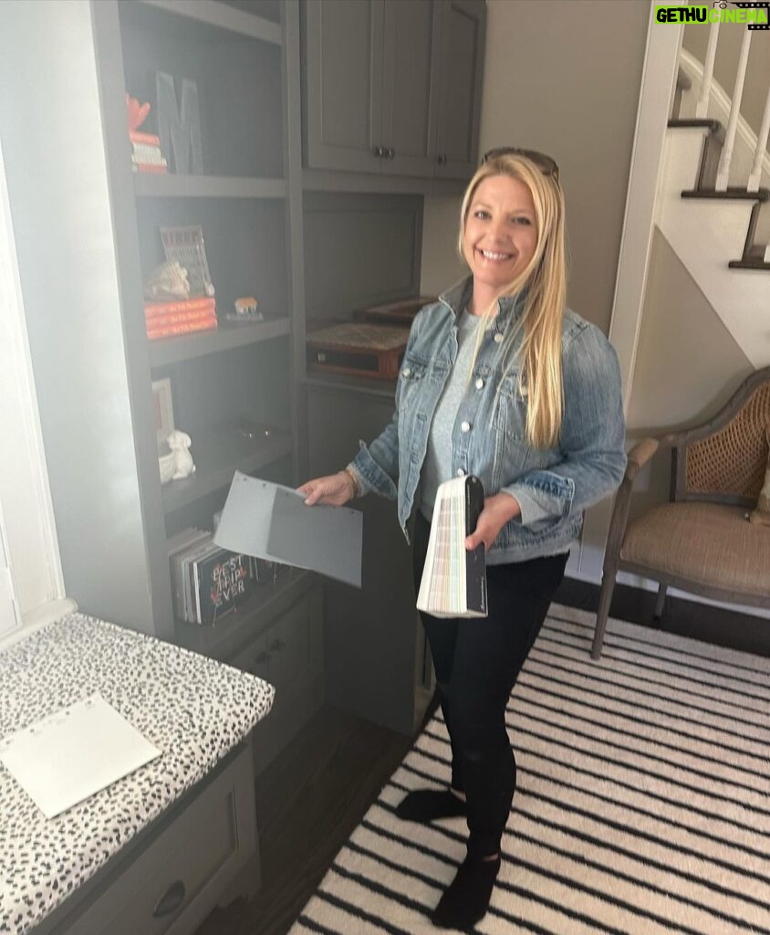 Meaghan B. Murphy Instagram - 🚨NEW 🏡 PROJECT🚨 Sometimes you need to fix 🛠️something that isn't broken just because it no longer works FOR YOU. That was the case with this sitting room. I loved the original design, but in 5 years NO ONE actually EVER sat in the sitting room. So, here's what we did to change that because with 3 kids and a dog we need to eek out every ounce of living space in our home: 🪑 First up, more functional furniture. We said goodbye to my oversized family heirloom chair (luckily Nana was excited to put it in her bedroom) and banished the stuffy (but pretty!) bench to my office. I saw these navy @potterybarn swivel chairs at my girlfriend's house and ordered them immediately. I have grown to appreciate the entertainment value of a swivel. Then I was at a loss, so I called in @thehavenly for a little design hand-holding. Havenly helped me land on this @arhaus table + ottomans & approved my striped @potterybarnkids rug choice (I needed the validation). WOWZA! Suddenly this space became a cozy spot for morning ☕️ after-dinner 🫖 and unwinding w/ a 🍷 where I can stare at my guitar 🎸 and the lyrics to Blackbird 🐦‍⬛ and manifest playing it someday. I think lessons would help. LOL The other big change here was brightening up the bookcases with a fresh coat of white. 🎨 I think it makes my book 📕 ⚡️& beloved knickknacks pop. Leave it to @shadyladycolors and @amazingpaintingnj to make the magic 🪄 happen. We also added battery-operated book lights from @lampsplus that make me endlessly happy at night. 💡 Finally, @ellaallure killed it with the Dempsey-friendly performance fabric cushion in just the right orange-y shade + fun patterned pillows. What do you think? I love that my friend @sarapeterson_thenext who founded HGTV mag calls small projects like this a "Twirl Up." I'm working on a whole issue of @womansdaymag devoted to mini makeovers like this. If you have a project to share, DM or email me! #makeover #homeproject #homerenovation #homerenovations #homeprojects #painting #bookshelves #arhaus Home Sweet Home