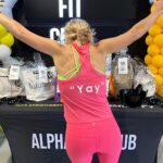 Meaghan B. Murphy Instagram - Consider the YAY broughten!!! 💗⚡️💦 BIG thanks to @alphafitclubshorthills for hosting the ultimate Pink Out to raise awareness and support for #breastcancer research. I got to live out my Brittney Spears fantasies + rock a headset to kick it off the event with a YAY on my back, so there’s that. (Thank you to @lululemon #summit for the swag!) The gym was LIT with electric energy. I am beyond grateful to have so many bright, shiny stars in my life...who like to sweat! Love you, ladies, plus Big Tom! #breastcancerawareness #breastcancer #shorthills #alphafitclub #njfitness Alpha Fit Club Short Hills