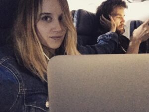 Megan Park Instagram - He has no idea I took this but the fact that we've been silently working next to each other on this airplane for 3 hours but he looks over and smiles at me every few mins is making my heart explode 😍🤓😍