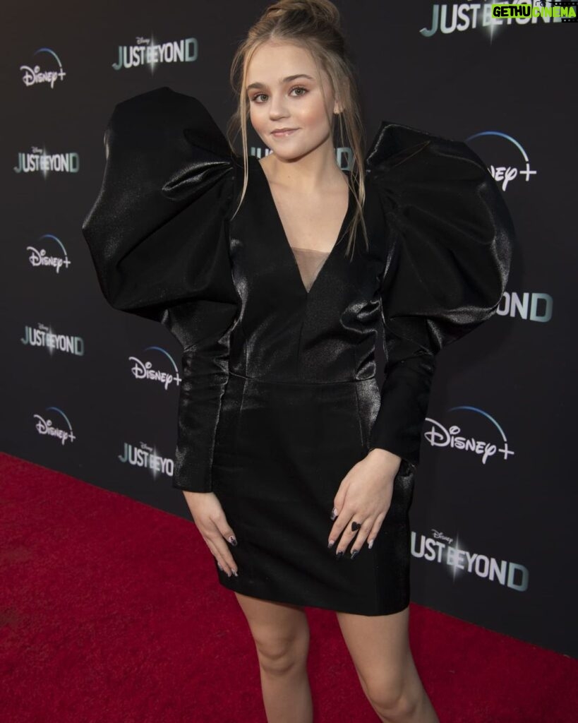 Megan Stott Instagram - Thank you @disneyplus for a amazing night❤ Absolutely love this look! #Hallowstream Stylist: @madisonguest @fashion_finds Dress: @ysl Shoes: @vincecamuto Makeup: @edwardcruz Hair: @drtn Jewelry: @maisonmiru @elisepaigejewelry BTS COMING SOON👻
