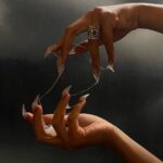 Megan Thee Stallion Instagram - I’ve really been into my new fang nails lately 🐍