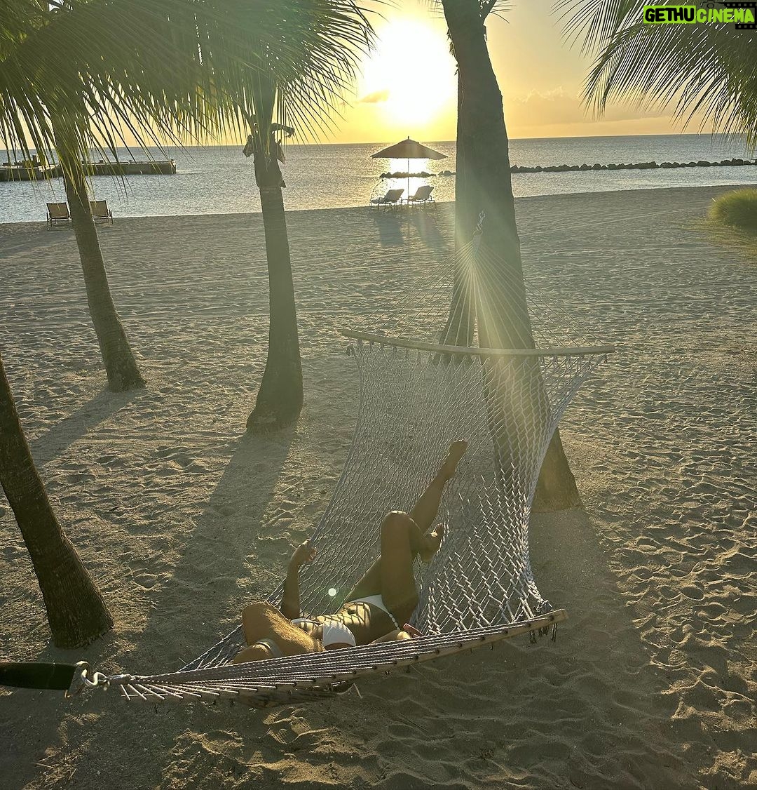 Melanie Liburd Instagram - Sand and suntan lotion. What a summer ✨ Four Seasons Resort Nevis, West Indies