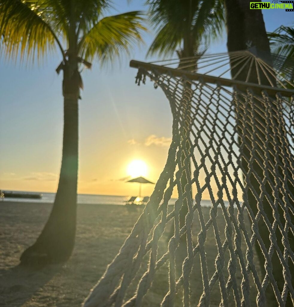 Melanie Liburd Instagram - Sand and suntan lotion. What a summer ✨ Four Seasons Resort Nevis, West Indies