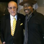 Michael Bearden Instagram - Happy Friday! Imma start dedicating my flashbacks to the OG’s in my career. First up, the man who signed Janis Joplin and Aretha when she left Atlantic. (Let that sink in!) Clive Davis! I first met Clive in the early 90’s. I was working with artists on his label Artista. Then I landed the gig with Whitney Houston. (1990) I was still a baby in this industry. That gig and Nip, saved me! I haven’t looked back since. Clive gave me some great and simple advice about working with artists. “The song always comes first!” I still believe that. However, (It was a different era) I ran into Clive recently at a popular establishment here in LA. We caught up briefly, (there was a lot of paparazzi out) he insisted they take this photo of us. . Living my dreams out loud. Gratitude! 🙌🏾 M~ #friday #fbf #flashbackfriday #clivedavis #starmaker #arista #whitneyhouston #singer #song #music #musicdirector #lovemylife #striveforgreatness #beinspired #believeinyourself #liveyourbestlife (pic.1 me and Clive in LA. pic.2 I snapped this at a party in Manhattan somewhere. Circa 1991)