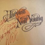 Michael Bearden Instagram - Big HBD🎉🎉 to the legend Neil Young! As a kid growing up on the south side of Chicago, the radio, and records were my close friends. Waaaaay before smart phones, social media and streaming. And for me, it didn’t matter what the genre was, or what color the artist was. I just loved music. ALL music! Still do. So imagine getting a call from a rock icon asking you to arrange and conduct an 80 + piece orchestra, and co-produce one of his records. 😳 It was yet another very surreal time in my whirlwind of a career I’ve had so far! If nothing else, I’m living proof you can come from anywhere and do anything if you believe you can! Enjoy 🎉Neil. And many more! (1/ me and Neil in studio. 2/ me and Neil at console. 3/ Neil’s classic record he signed for me! 4/ Neil thanking me for my work on his record. With the great Al Schmitt engineering. ☺️) s/o to the great Niko Bolas for making it all happen!