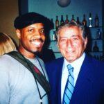 Michael Bearden Instagram - I first met Tony (Mr. Bennett) @itstonybennett in London. I was working at Royal Albert Hall with Liza Minelli as her pianist. (Yes, my career has been all over the place. ☺️ Blessed!🙌🏾)⠀ ⠀ Tony told me “that was some good piano playing man!” I was like, umm, you know you’re Tony Bennett? Lol 😆 ⠀ ⠀ Of course I said thank you and was quite flattered by the compliment. I wasn’t expecting that from the legend. He’s heard 1000’s of musicians. But, that’s just the kind of guy he is. ⠀ ⠀ What a treat it’s been to get to know him over the years and, quite the honor to be conducting the orchestra for him at Radio City Music Hall tonight, on his 95th birthday!⠀ ⠀ HBD🎉🎉 Tony! And, many more! M~ #tonybennett #legend #icon #birthday #ladygaga #radiocitymusichall #singer #best #loveforsale #natureisboss #spreadlove