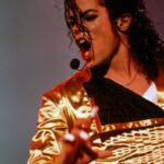 Michael Jackson Instagram - An Associated Press headline read “Dangerous Tour Kickoff Wows Munich." On this date in 1992, 70,000 in the German city’s Olympic Stadium were in attendance for this show. The AP reported that MJ “tore through ‘Beat It’, ‘Billie Jean’, and ‘Black or White’ accompanied by balloons, giant video screens, and numerous wardrobe changes that ranged from an 18-karat gold body suit to a black vampire cape."