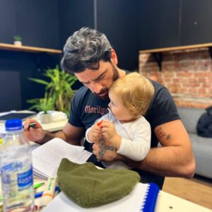 Michele Morrone Instagram - Well we don’t really have the same colors (he took more from mom’s side) but yep, this little turtle will be playing my son in #subservience and yep.. he’s helping study the script.
Cheers 🫀