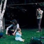 Micky Dolenz Instagram - From Written in Our Hearts- “After seeing the photos of Micky Dolenz with Cass Elliot's daughter Owen Elliot-Kugell at the Hollywood Walk of Fame ceremony for Cass Elliot yesterday on October 3, 2022, we were reminded of this photo of Micky with Owen when she was just a wee one! That's David Crosby, Joni Mitchell, Eric Clapton, Micky Dolenz, and baby Owen at Cass Elliot's home in Laurel Canyon in 1968! 🙂” #mickydolenz #owenelliotkugell #mamacasselliot #hollywoodwalkoffame