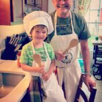 Micky Dolenz Instagram - From Emily Dolenz @turtleandthebee site- “Gramps teaching Chef Huxley to cook. I learned so much about growing food from my dad and mum. Now we all swap gardening tips and cook together.”🥰👩🏻‍🌾👨🏻‍🍳 #growyourownfood #gardening #familytime #cookingathome #homecooked #freshfood #monkees #permaculture #homegarden #familyfood #cookingwithkids #mickydolenz @turtleandthebee