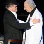 Micky Dolenz Instagram - I still can’t believe it’s been one year since that final performance with my partner Nez at The Greek Theatre in Los Angeles. He was gone less than a month later.. Still haven’t fully processed it. Miss ya Nez! #MichaelNesmith @greek_theatre #mickydolenz #michaelnesmith @videoranchofficial #themonkees