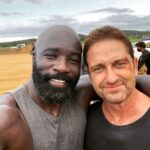Mike Colter Instagram - @gerardbutler and I have decided to come into your living rooms. @planemovie is still in the theaters but if you're not able to get out and see it then you can now WATCH IT AT HOME! @planemovie @lionsgate #hometheater #actionmovies Your Home