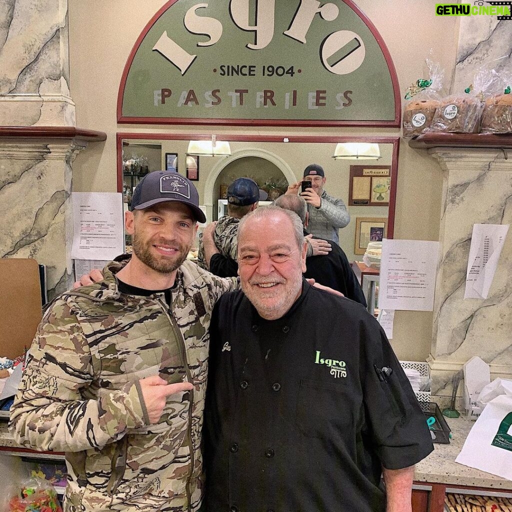 Mike Vogel Instagram - So, back up in Philly for the Eagles/Giants game tonight (go 🦅!). The big galoot taking the picture (in the mirror) is my buddy, former Eagles defensive lineman, @paulgrasmanis . I decided to take Paul to one of the oldest Italian bakeries in Philly, @isgro_pastries . We met Gus, the owner who we talked with for almost thirty minutes about the eagles and his experience making pastries for the pope, etc. I miss and love this city so much! But more importantly, I told Gus how much we need a bakery like his in Nashville. I would appreciate it if y’all would chime in and tell Gus that it’s time to open @isgro_pastries - Nashville! 😎. @philadelphiaeagles #gobirds🦅 #italia #eatmorepastries