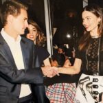 Miranda Kerr Instagram - On this day in 2014, fate (and @louisvuitton) brought Evan and I together at a dinner at the MOMA in NYC. The magical moment we met was captured 📸 9 years ago🥹🌈💌