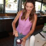 Miranda Kerr Instagram - I can’t believe it’s finally here!! Introducing my KORA Glow Smoothie 💜 We’re celebrating the launch of our @koraorganics Plant Stem Cell Retinol Alternative Moisturizer all month long with our friends at @erewhonmarket! We might be biased, but my baby and I think it’s the best smoothie we’ve ever had 😉🤰🏻 We included some of my favourite skin-loving and pregnancy safe ingredients inspired by the age defying range: 🌱 Organic @SAMBAZON Unsweetened Açaí Superfruit Packs 🌱 @CopinaCo Vanilla Plant-Based Collagen Boost 🌱 @Cocojune_organic Pure Coconut 🌱 @CalifiaFarms Organic Almond Milk + so many more! All net proceeds go to @OrganicFarmingResearch in support of educating & empowering sustainable organic harvesting practices 🌾