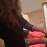 Mo Collins Instagram - I don’t play piano. Always wished I did. But when I was a teenager (we HAD a piano! But Mom wouldn’t let me get lessons. 😂) I would tinker. I had come up with a song. Here’s me on Sia’s piano (!!!) TRYIN to remember it decades later 😂 Strange to see my 58 year old hands down there. A lot has changed since I first came up with this. I remember my Mom calling from the other room to stop because “everything you play is so depressing!” 😂😂😂 So I went into comedy. BOOM!! 😂 #piano #artistsoninstagram #siaspiano #artist #comedy