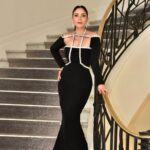 Mona Zaki Instagram - Ready to hit the red carpet ♥️ @festivaldecannes @lorealparis Stylist: @cedrichaddad Dress: @georgeshobeika Jewelry: @bulgari Hair: @ilhammestour Makeup: @elladasatoueva Photography: @ranifawazofficial #Cannes #CannesFilmFestival
