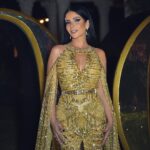 Mona Zaki Instagram - A Golden Night 🌟 with @voguearabia Stylist: @cedrichaddad Dress: @zuhairmuradofficial Jewelry: @bulgari Bag: @sandraj_handbags Makeup: @ojmakeupartist Hair: @rafifazaa Photo: @ranifawazofficial Raffles The Palm Dubai