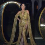 Mona Zaki Instagram - A Golden Night 🌟 with @voguearabia Stylist: @cedrichaddad Dress: @zuhairmuradofficial Jewelry: @bulgari Bag: @sandraj_handbags Makeup: @ojmakeupartist Hair: @rafifazaa Photo: @ranifawazofficial Raffles The Palm Dubai