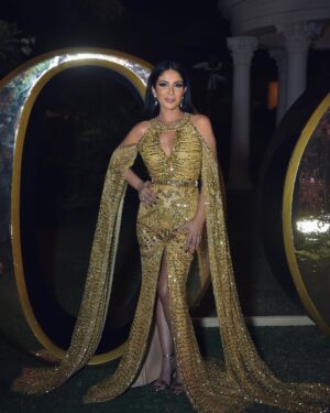 Mona Zaki Instagram - A Golden Night 🌟 with @voguearabia 

Stylist: @cedrichaddad 
Dress: @zuhairmuradofficial 
Jewelry: @bulgari 
Bag: @sandraj_handbags 
Makeup: @ojmakeupartist 
Hair: @rafifazaa 
Photo: @ranifawazofficial