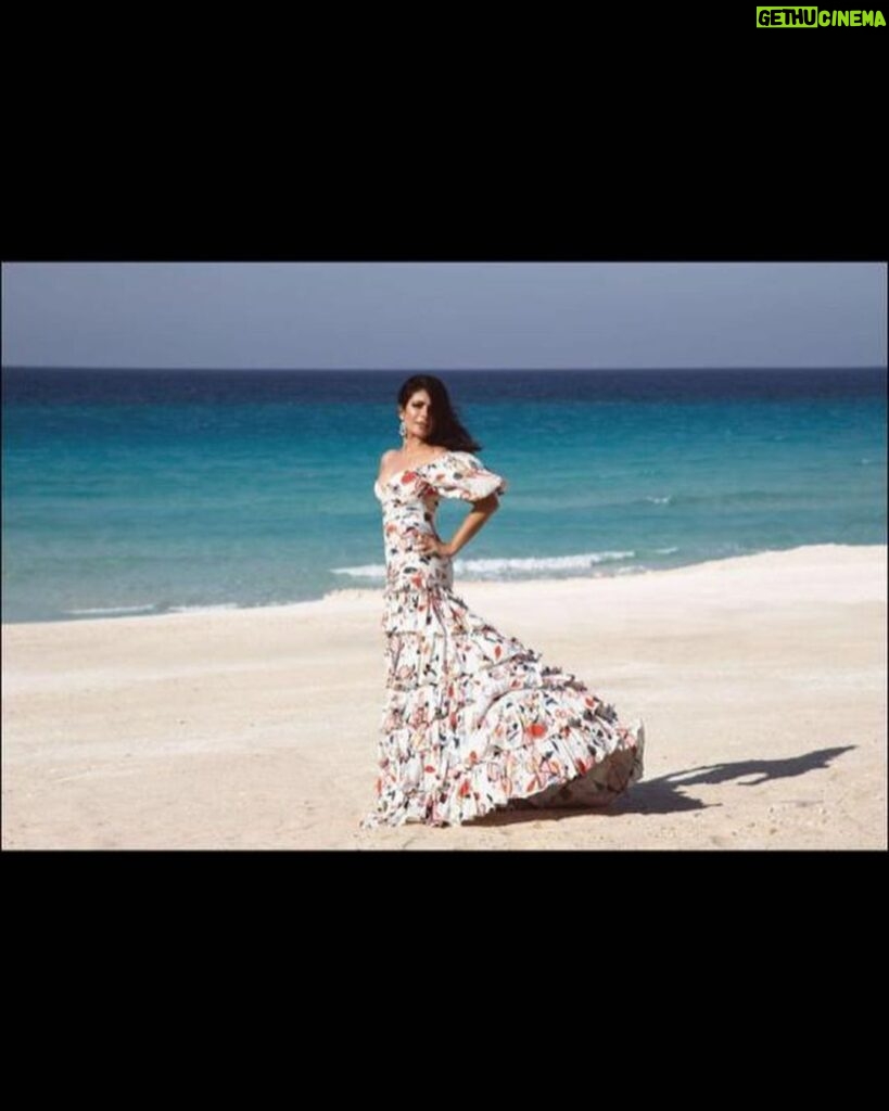 Mona Zaki Instagram - Ending summer on a happy note 😊 First look from my latest shoot with @soochfashion ❤️ Dress: By my friend the talented.. Eclectic designer @mrskeepa Jewellery: By the magnificent @dimajewellery The Amazing Team Photography: @bilohussein Cinematography: @afilmbyseifismail Styling: @maigalal Make Up: @monagamalofficial Hair: @tahergamil1 Celebrity Management: @ginger__tm