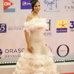 Mona Zaki Instagram - Yesterday was a dazzling night at the opening ceremony of @elgounafilmfestivalofficial. Thank u @maigalal for my red carpet look You always give your utmost dedication and tolerance for me❤ Thank u @maisonyeya for the magnificent dress your creativity and classy taste makes you who you are the queen of bridal and evening dresses❤ Thank u @dimajewellery the look was completed with your heavenly designed diamond pearl earings Thank u @sorayashawky for my beautiful make up u master what u do❤😘 Hairdresser @ashour_201__hair_styilst thank u ❤😘 Ring @elmawardyjewelry 💍❤ Photo credit @mahmoud.taki @norayoussef_photography @hamedz199