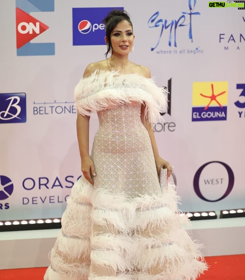 Mona Zaki Instagram - Yesterday was a dazzling night at the opening ceremony of @elgounafilmfestivalofficial. Thank u @maigalal for my red carpet look You always give your utmost dedication and tolerance for me❤ Thank u @maisonyeya for the magnificent dress your creativity and classy taste makes you who you are the queen of bridal and evening dresses❤ Thank u @dimajewellery the look was completed with your heavenly designed diamond pearl earings Thank u @sorayashawky for my beautiful make up u master what u do❤😘 Hairdresser @ashour_201__hair_styilst thank u ❤😘 Ring @elmawardyjewelry 💍❤ Photo credit @mahmoud.taki @norayoussef_photography @hamedz199