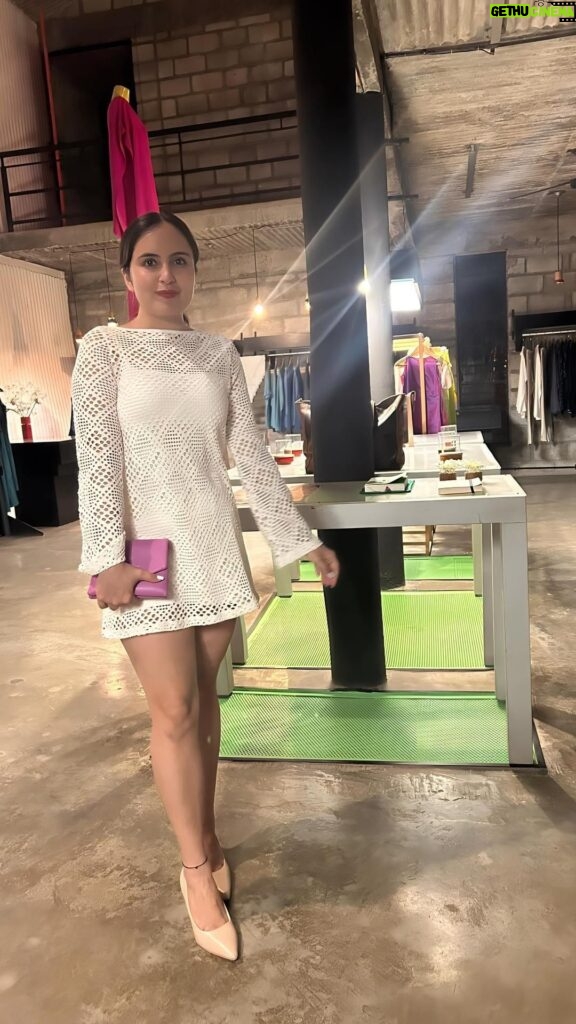 Mridanjli Rawal Instagram - “🌟 White After Dark: Effortless Evening Glam! 🌙✨ I’ve got my go-to white dress, a sassy red lip, comfy nude heels, a touch of purple flair, and a no-fuss ponytail – and I’m ready to own those evening vibes! 💋👠💜 Want to rock white for those night outs without a worry? Keep it simple! Slip into your favorite white piece, add a pop of color (like my red lips), and let your confidence shine. Share your nighttime white wardrobe hacks – together, we’ll slay the evening fashion game! 💃🌃 #EveningElegance #WhiteNights #EffortlessGlam #OOTD” #reelsi̇nstagram #wednesday #whitedress #redlips💋 #redlipstick #howtowearwhite #whiteforevening #reelsindia #bengaluru_diaries #dinnerdatenight #dinnerdate #nudeheels #eveningvibes #musicismylife #eveningidea #reelkarofeelkaro #trendingmusic
