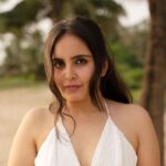 Mridanjli Rawal Instagram - Beach Pics? Go white, Shine Bright✨🤍 Here’s how: -White Color Reflects sunlight, keeping you cooler in hot conditions. -Creates a bright and fresh aesthetic against the natural beach backdrop. -Enhances natural lighting, reducing harsh shadows on your face. -Provides a photogenic contrast, making you stand out amidst vibrant beach colors. -Offers an elegant and timeless look that exudes sophistication. -Versatile and easy to accessorize, allowing for various styles. -Complements the beach environment -Perfect for capturing relaxed and carefree lifestyle shots. : : Credits: @picx.medias #instagood #instagram #love #home #heavan #white #live #music #soothing #photoshoot #photography #howtodress #whitedress #blog #wednesdayvibes #wednesday #beach #smile #goa #cansaulim #home