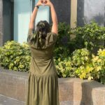Mridanjli Rawal Instagram - Add unique twist to your wardrobe this Christmas! Here’s how you can style yourself: ⭐️Start with a Base: Choose a vibrant green long dress. It’s both eye-catching and elegant. ⭐️Add Comfort and Style: Pair your dress with cozy stockings. They’re not just comfortable; they also add a chic touch to your outfit. ⭐️Go Sporty: Break the norms by wearing sports shoes. This adds an unexpected, trendy edge to your ensemble. ⭐️Accessorize with Shine: Opt for golden color fashion jewelry. It brings a touch of luxury and complements the green of the dress beautifully. ⭐️Cute Detailing: Finally, tie your hair with a cute rubber band bow. It’s a playful and charming addition that rounds off the look perfectly. If you like this video, like, share , comment and save♥️ #merrychristmas #insta #instagood #fashion #fashionideas #howtowear #christmasdresses #howtodressforchristmas #fashion #india #reelviral #reelkarofeelkaro #mondaymotivation #live #loveislove #christmas #accessories #dressup #howtodressup #sportsshoes #musicislife #dance