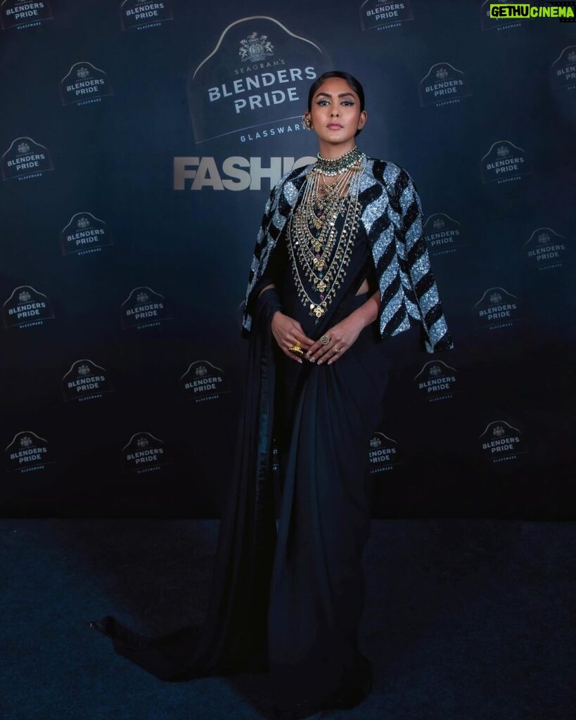 Mrunal Thakur Instagram - To an unforgettable night filled with all the #GlossAndGlam 🔥🫶🏻 Had a fantastic time stepping into the beautiful world of fashion and style with #BlendersPrideFashionNXT for @jjvalaya’s @jjv.kapurthala collection ✨. With JJ we can’t say third time is a charm because it has always been my pleasure working with you. You have always left me stunned with your collection. Blenders Pride Glassware Fashion NXT was more than a fashion showcase; it was a celebration of the future of fashion. The way J.J. Valaya has captured the essence with black, white and gold, it’s like he’s painted a masterpiece on fabric. Thankyou for having me JJ and @blenderspridefashiontour 🤍 #BlendersPrideFashionNXT ​#TheNXTinFashion #BlendersPride #MyLifeMyPride #Collab