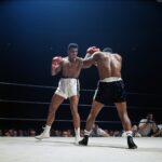Muhammad Ali Instagram - Muhammad Ali in action vs Floyd Patterson during their fight at the Las Vegas Convention Center. ⁣ ⁣ November 22, 1965.⁣ ⁣ 📸: @neilleiferphotography⁣ ⁣ ⁣ #MuhammadAli #Icon #FloydPatterson #GOAT #Champion #LasVegas #Fight #Boxing