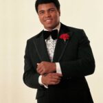 Muhammad Ali Instagram - Casual portrait of Muhammad Ali wearing a tuxedo during a photo shoot at Playboy Studios. ⁣ ⁣ Chicago, IL.⁣ November 1974.⁣ ⁣ 📸: @neilleiferphotography⁣ ⁣ ⁣ #MuhammadAli #Icon #PhotoShoot #Champion #Boxing #GOAT #Portrait #Chicago