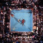 Muhammad Ali Instagram - Aerial view of George Foreman after the round 8 knockout by Muhammad Ali at Stade du 20 Mai. ⁣ ⁣ 📸: @neilleiferphotography⁣ ⁣ ⁣ #MuhammadAli #Icon #RumbleintheJungle #MuhammadAlivsGeorgeForeman #Boxing #Legendary #GOAT #Champion
